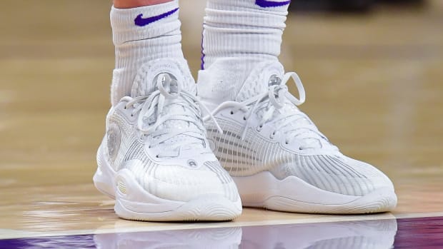 Los Angeles Lakers guard Austin Reaves' white Rigorer sneakers.